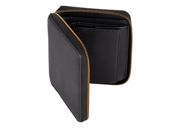 istock Black leather wallet with golden zipper isolated 2231483390