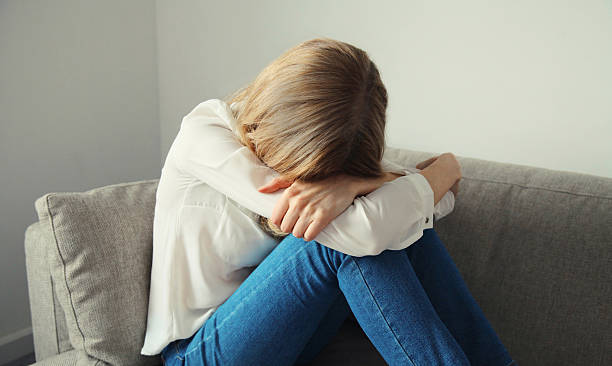istock Upset sad crying woman while experiencing mental suffering, depression, fatigue, emotional stress 2231486346