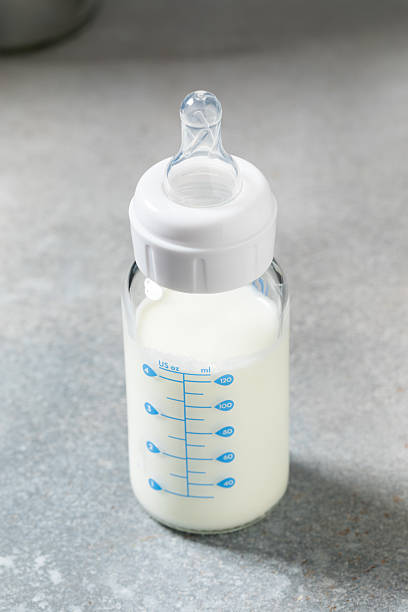 istock Organic Healthy Baby Bottle with Organic Formula 2231488146