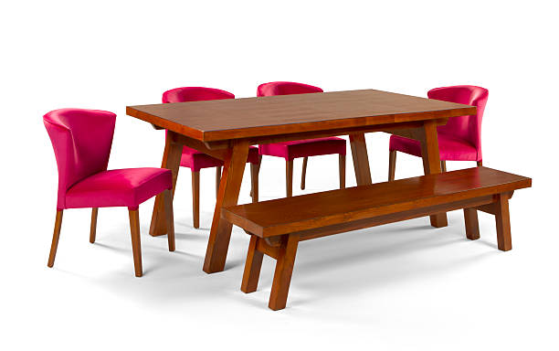 table and red chair isolated on white background . dining table