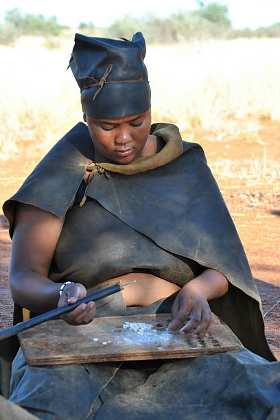 Indigenous people from the Wassú tribe and tourists performing traditional dance in the village