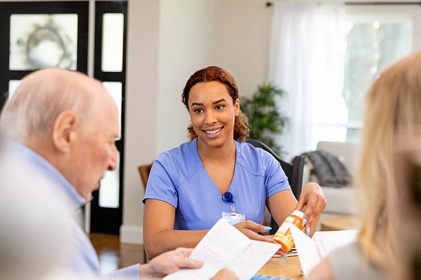 istock Home Healthcare Worker Discussing Medication with Patient 2231502183