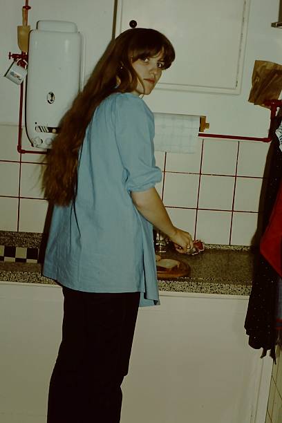 istock Young Woman preparing Dinner back in the Seventies. 2231523173
