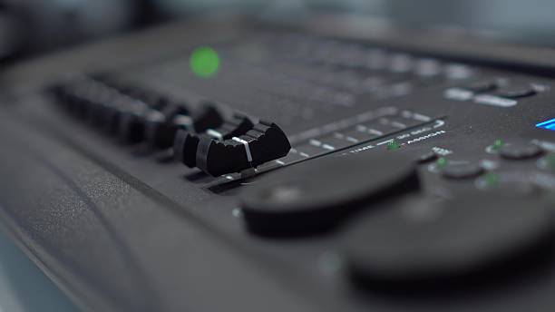 istock Smooth camera focus movement along lighting console panel showing detailed professional equipment overview in 4K format 2231536015
