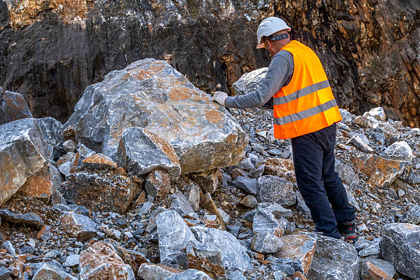 istock Geologist inspecting a mine,Explorers collect soil samples in search of minerals. 2231545797