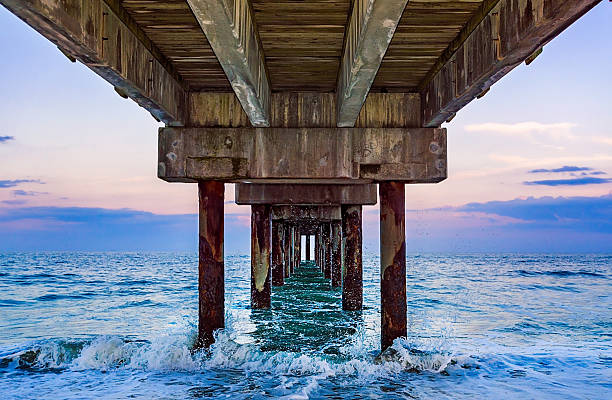 istock Waves crash at the St. Johns County Ocean Pier in St. Augustine Florida 2231548496