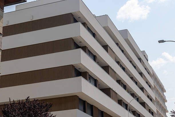istock Modern apartment building with balconies reaching for the sky 2231555165