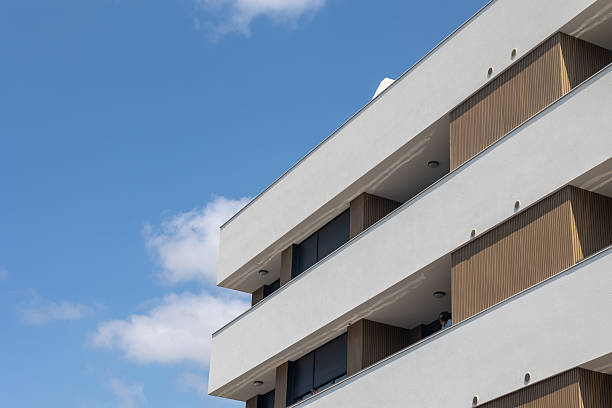 istock Modern apartment building reaching for the sky on a sunny day 2231555178