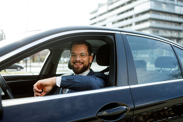 istock Businessman Driving Car 2231565556