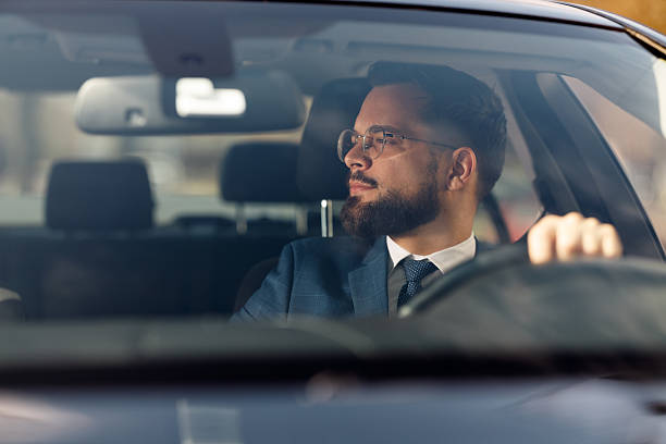 istock Businessman Driving Car 2231565560