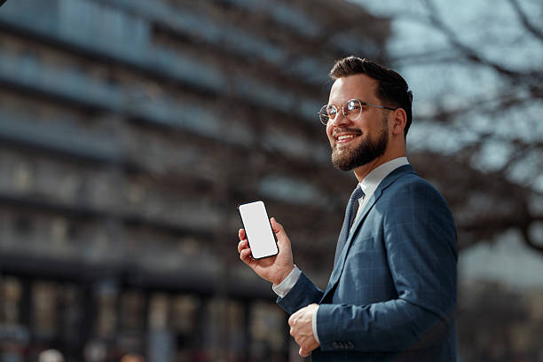 istock Businessman Showing Smartphone Screen 2231565596
