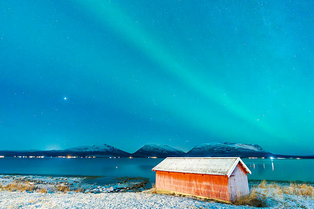 istock Cabin Under the Northern Lights 2231576659