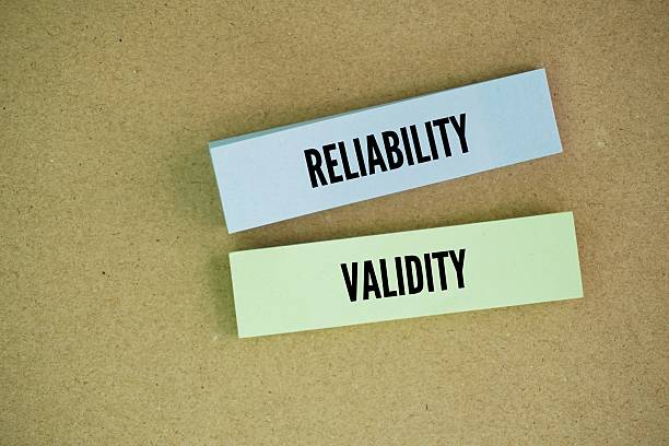 istock Colored paper with the words reliability and validity. Reliability refers to the consistency of a measure, while validity refers to the accuracy of a measure. 2231579947