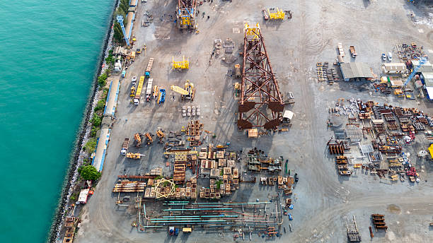 istock The company assembles large drilling rig structures next to the sea for easy transport onto ships. shipyard for transporting large structures onto ships. 2231587504