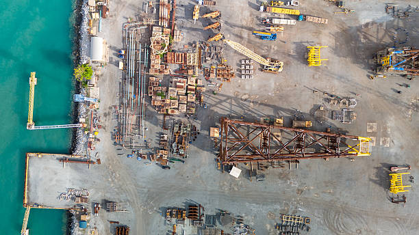 istock The company assembles large drilling rig structures next to the sea for easy transport onto ships. shipyard for transporting large structures onto ships. 2231587622