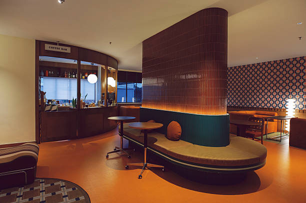 istock Retro-Style Coffee Bar Lounge Interior with Warm Lighting 2231587632