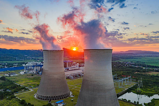 Thermal power plant at sunrise