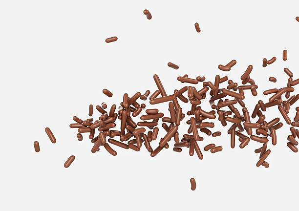 istock Chocolate Sprinkles For Cakes And Bakery Items Scattered On White Background 3D Illustration 2231595764