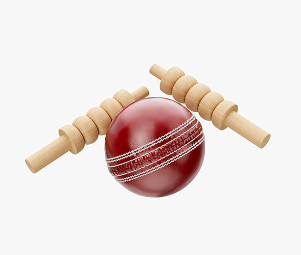 istock Shiny Red Leather Stitched Test Cricket Ball With Two Wicket Bails White Background 3D Illustration 2231595804