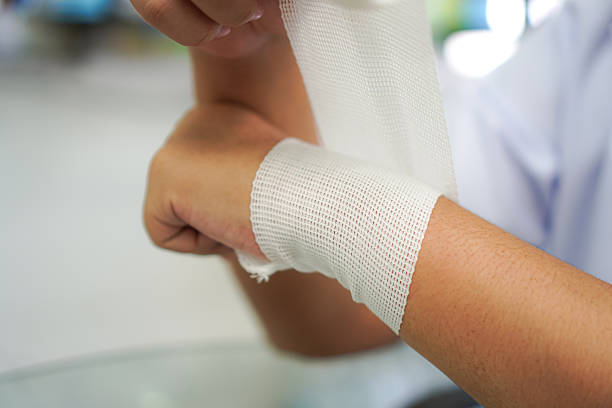 istock Wrist Bandaging with White Gauze for First Aid 2231597651