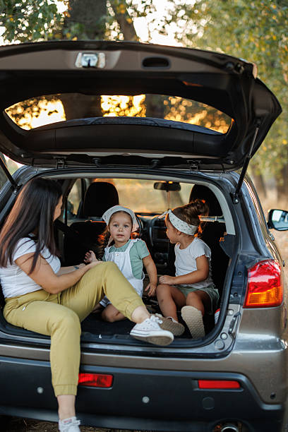istock Happy family taking a break during road trip through summer nature 2231597841