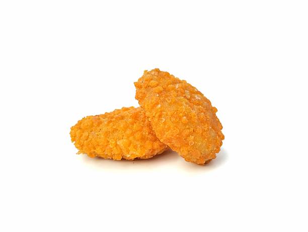 istock crispy fried chicken nuggets isolated on white background 2231598136