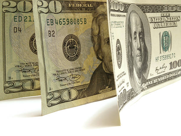 istock Money dollars on a white background 2231603606