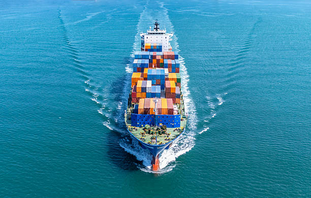 istock Aerial front view of a large sized, loaded container cargo vessel in transit. 2231604302