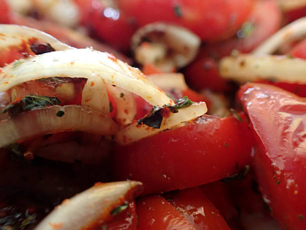istock Tomato and onion salad 2231607944