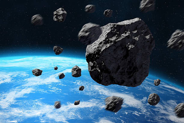 istock Earth and Asteroids. Falling Meteorites in the Earth's atmosphere. 2231611389