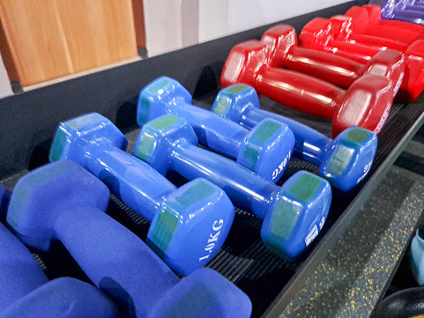 istock small Dumbbells  in a gym 2231615516