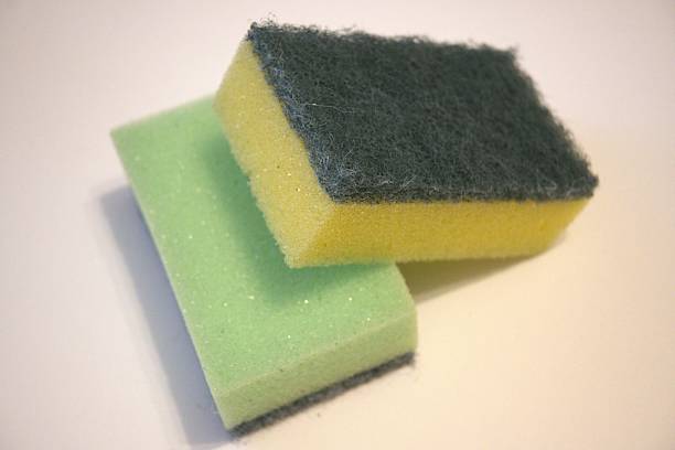 istock Two dishwashing sponges on white background, close-up with copy space 2231617156