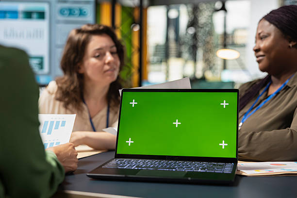 Diverse businesswomen using copy space mockup for performance indicators