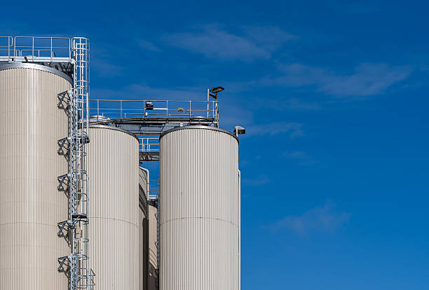 Germany, Berlin, Lichtenberg, August, 22, 2025 - Storage silos of a factory