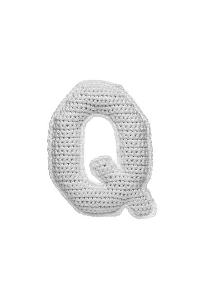 istock Handmade crocheted letter Q in light grey yarn, isolated on white background, soft textured decoration or toy 2231626563