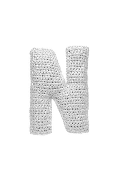 istock Handmade crocheted letter N in light grey yarn, isolated on white background, soft textured decoration or toy 2231626577