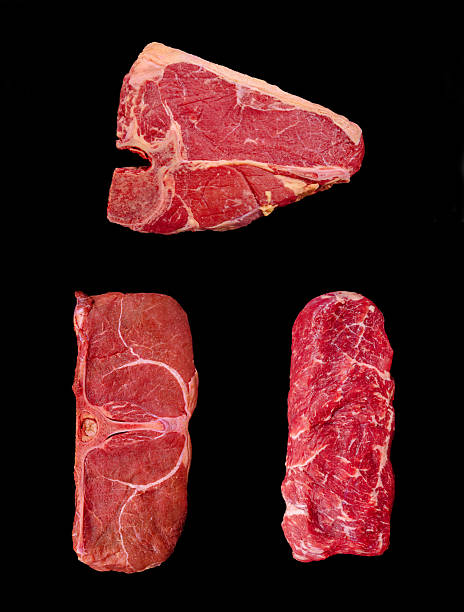 istock Different cuts of beef displayed on a black background for culinary perspective 2231627851