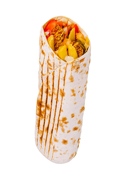 istock Crispy chicken wrap filled with fresh vegetables and sauces ready to enjoy 2231627866