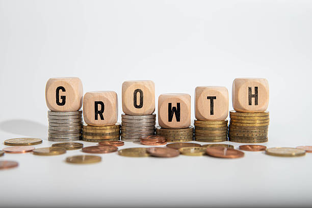 istock Coin in glass bottle with money stack step up growing growth saving money 2231628340