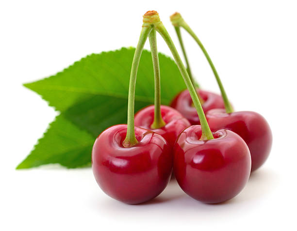 istock Fresh cherries with green leaves isolated on white background 2231632728