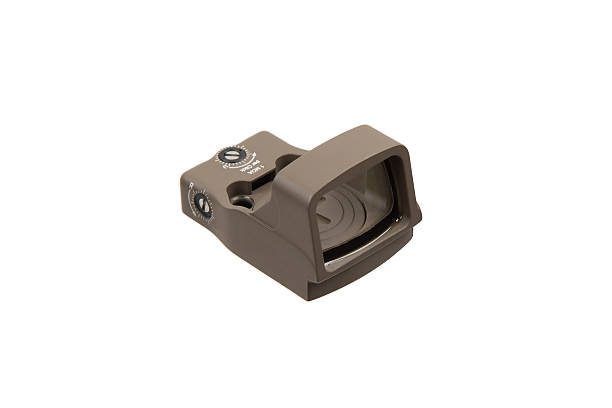 istock A tan firearm optic with a reflective lens on a pure white background. 2231634047