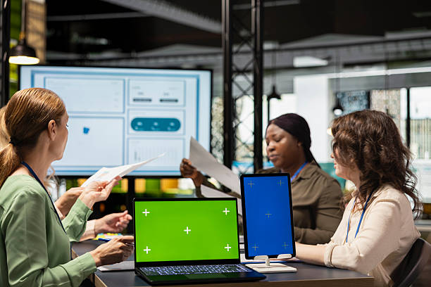 istock Team of determined colleagues collaborating with isolated copy space display 2231634366