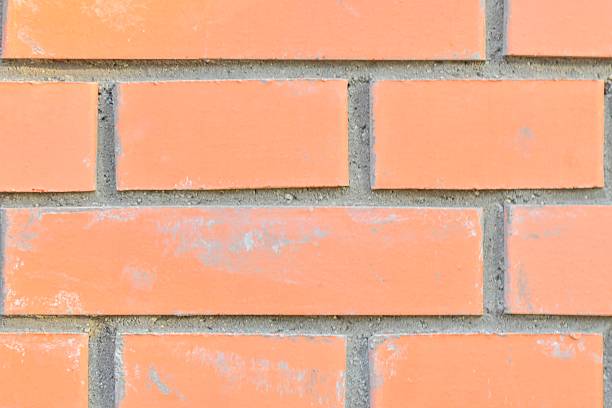 View of brick background. Brick masonry. Brick base. Brick backdrop. Building and structure concept. Macro image, close-up