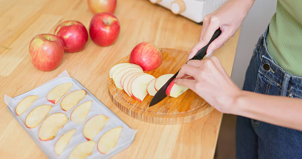 istock Asian Woman dried fruit preparation 2231634613