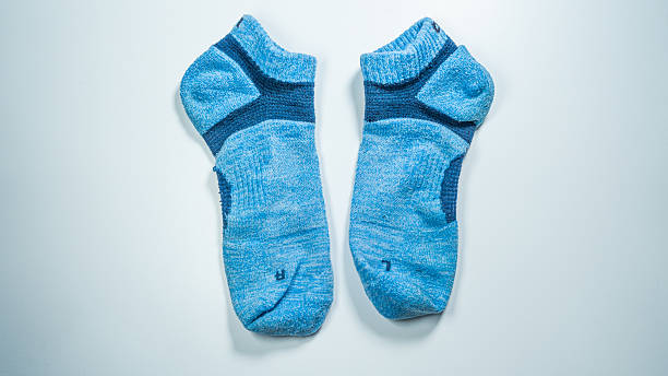 Warm, woolen knitted socks isolated on white background. Warm socks made of wool for winter season.