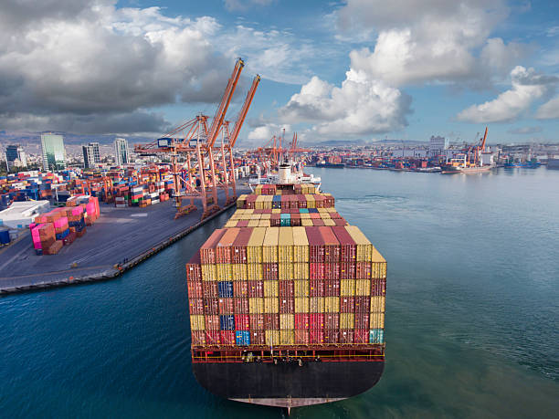 istock Aerial back view of large cargo container ship in transit. 2231635327