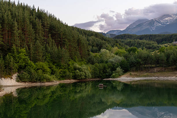istock Tranquil Lake with Forest and Pirin Mountains in Bulgaria 2231636432