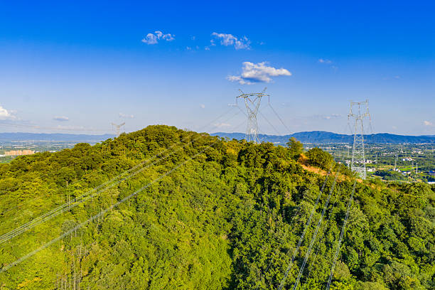 istock High-voltage Transmission Towers on a Mountain 2231636493