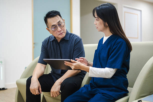 istock Tablet-Assisted Health Report Review 2231636988