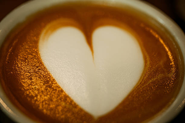 a cup of coffee, a cup on a red background